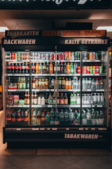 a display case filled with lots of drinks