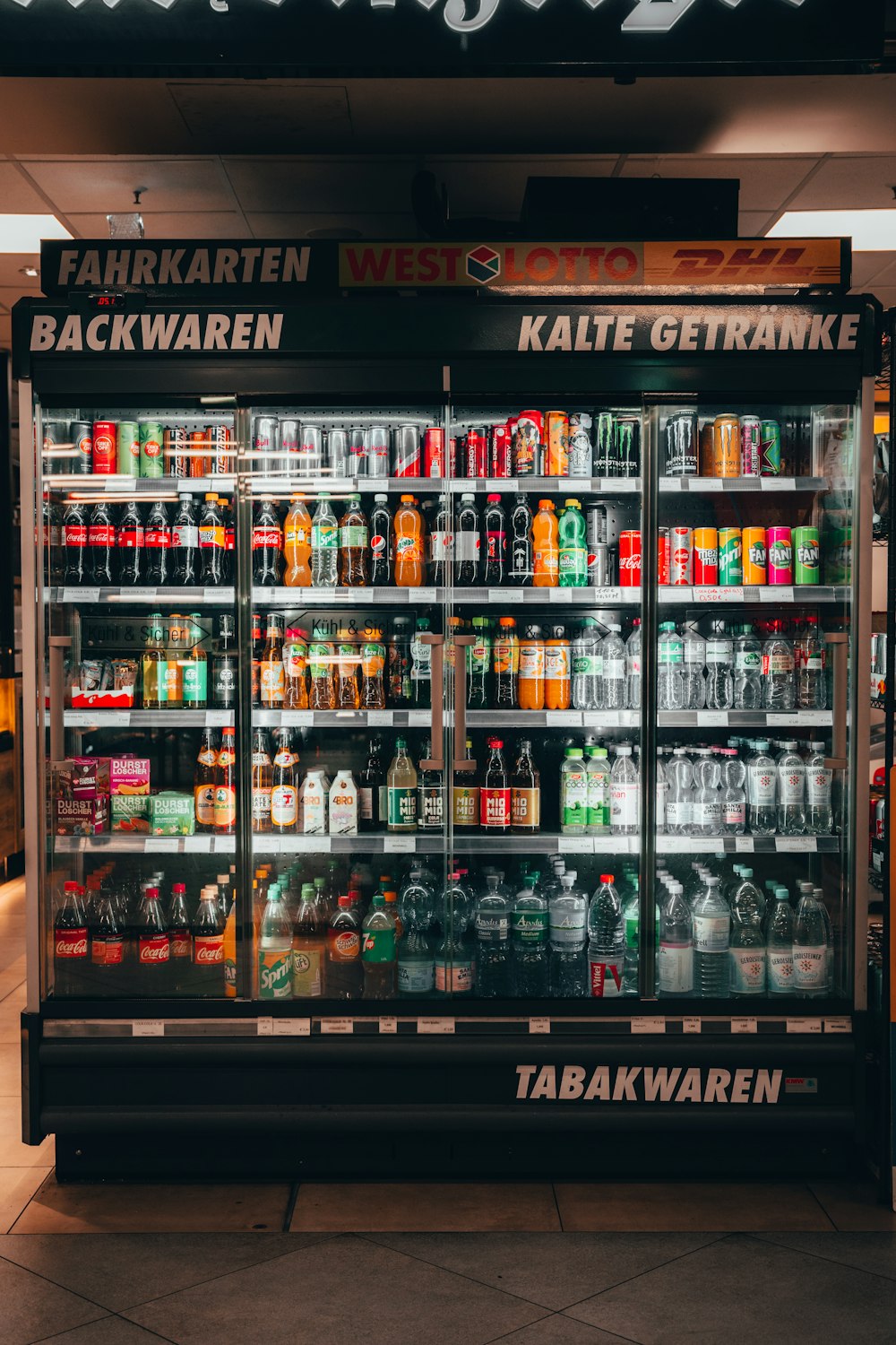 a display case filled with lots of drinks