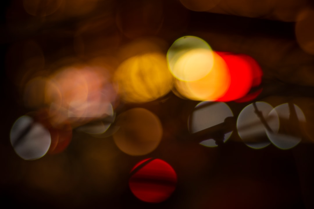 bokeh photography of red yellow and white lights