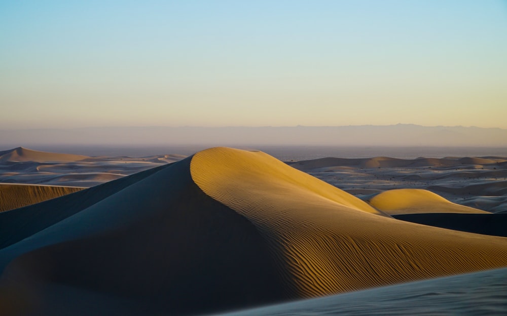 desert under blue sky during daytime