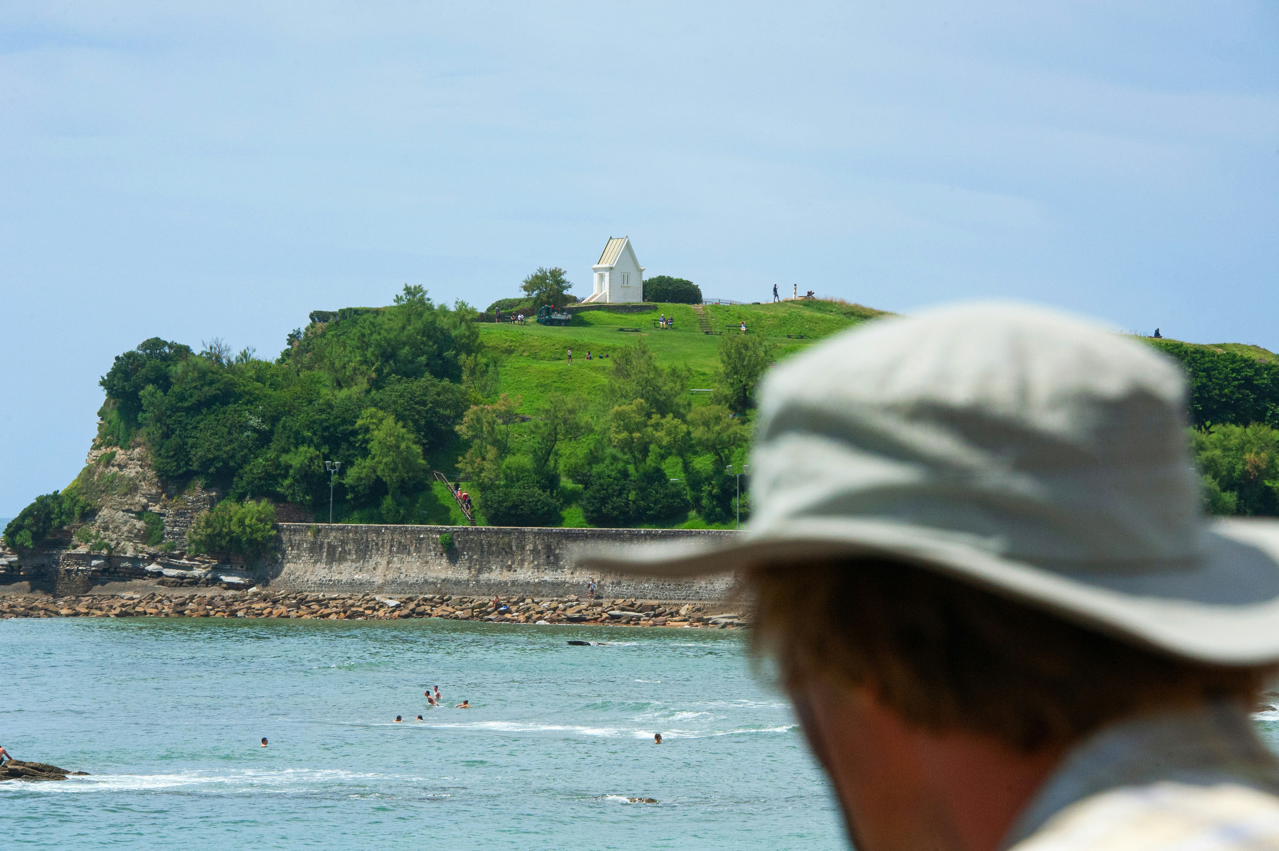 Traveler checking eSIM connection on phone in Fort-de-France, Martinique, French West Indies