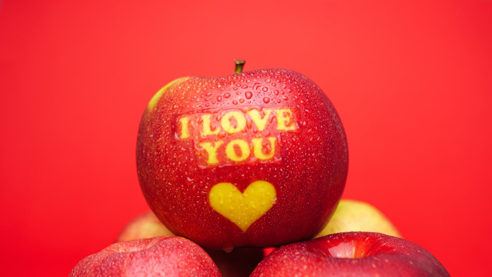 red and yellow i love you print apple