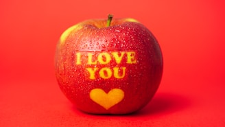 red and white i love you printed apple