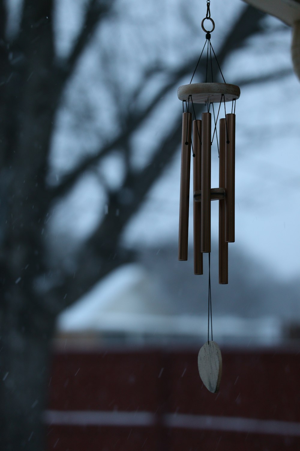 gray wind chime on roof