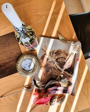 A rustic wooden table displaying a variety of wax melts with warm, inviting tones.