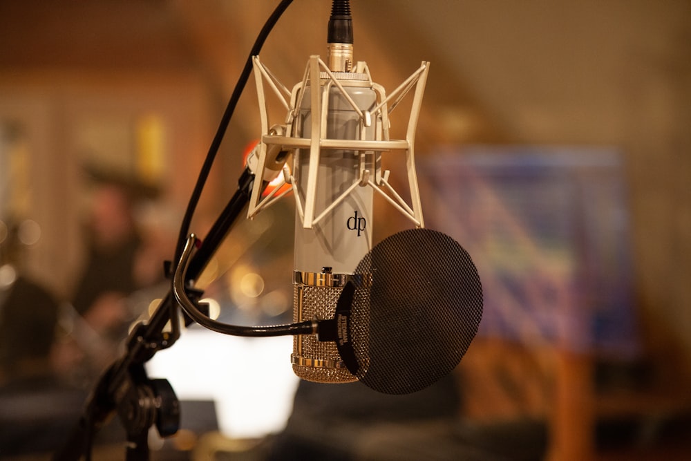 black and silver microphone with stand