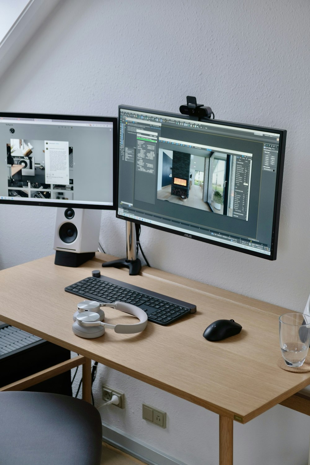 black flat screen computer monitor on brown wooden desk