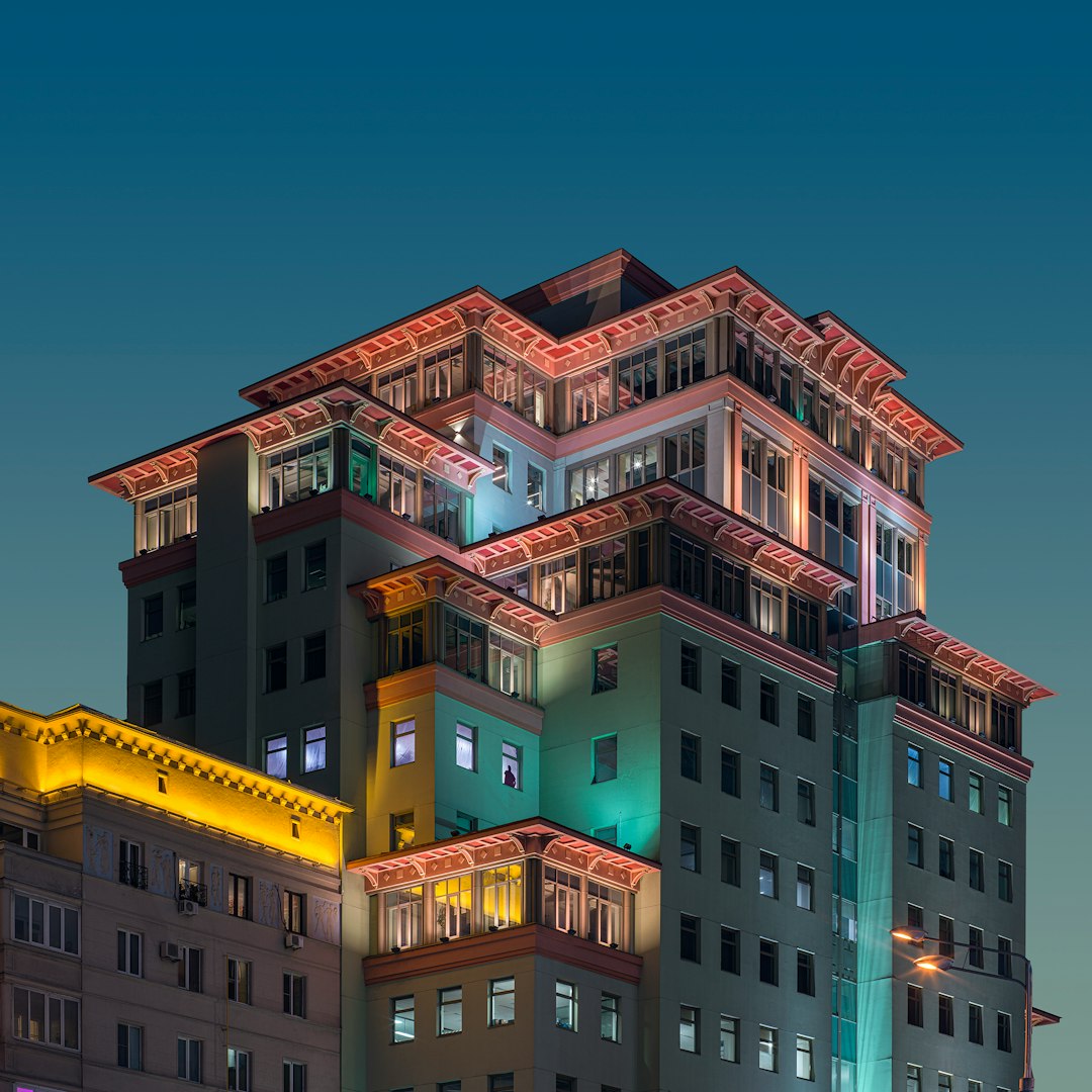 brown and white concrete building under blue sky during daytime