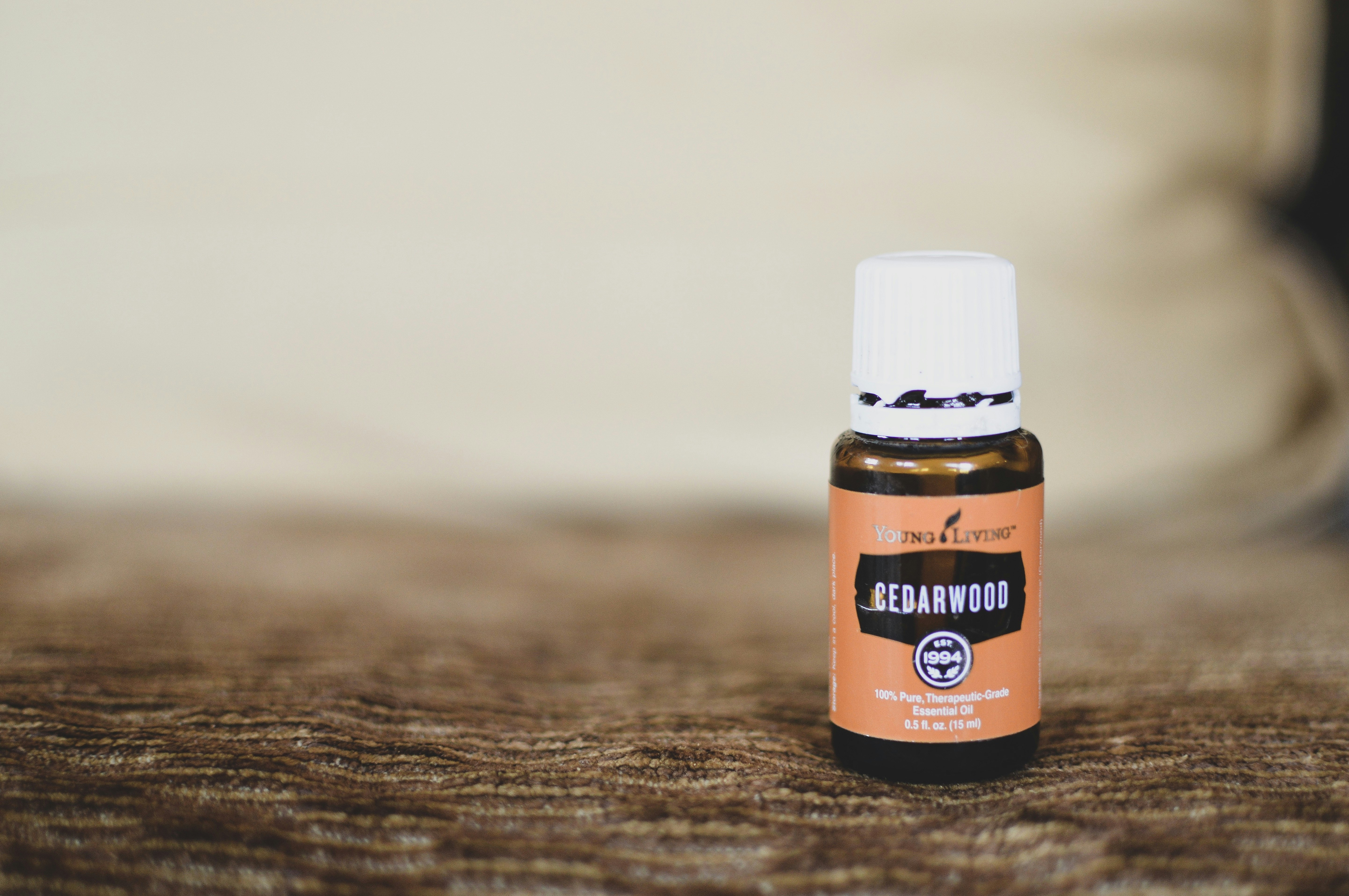 orange and white labeled bottle