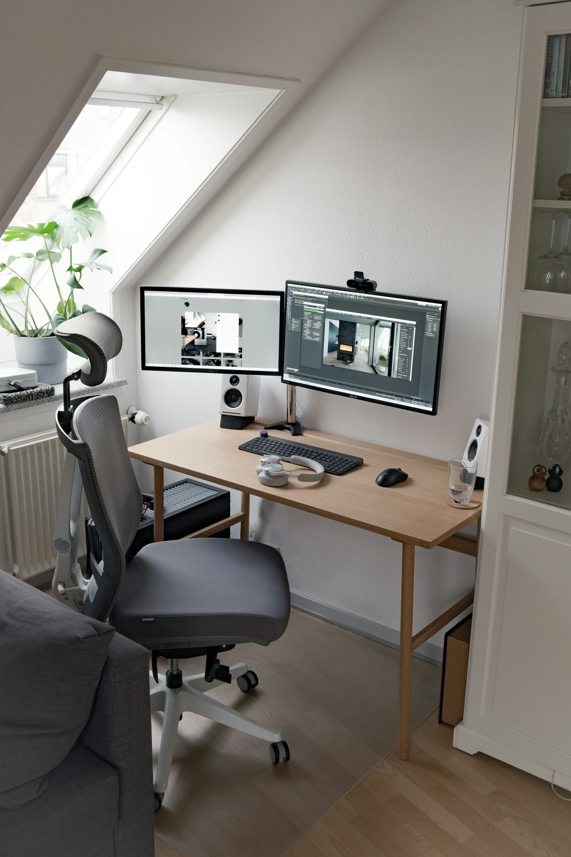 black flat screen computer monitor on brown wooden desk
