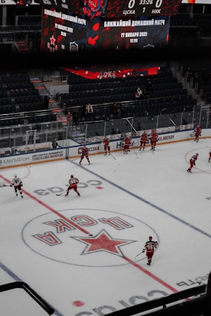 Fans watching hockey players on the ice at a professional arena, representing opening night crowds in Henderson