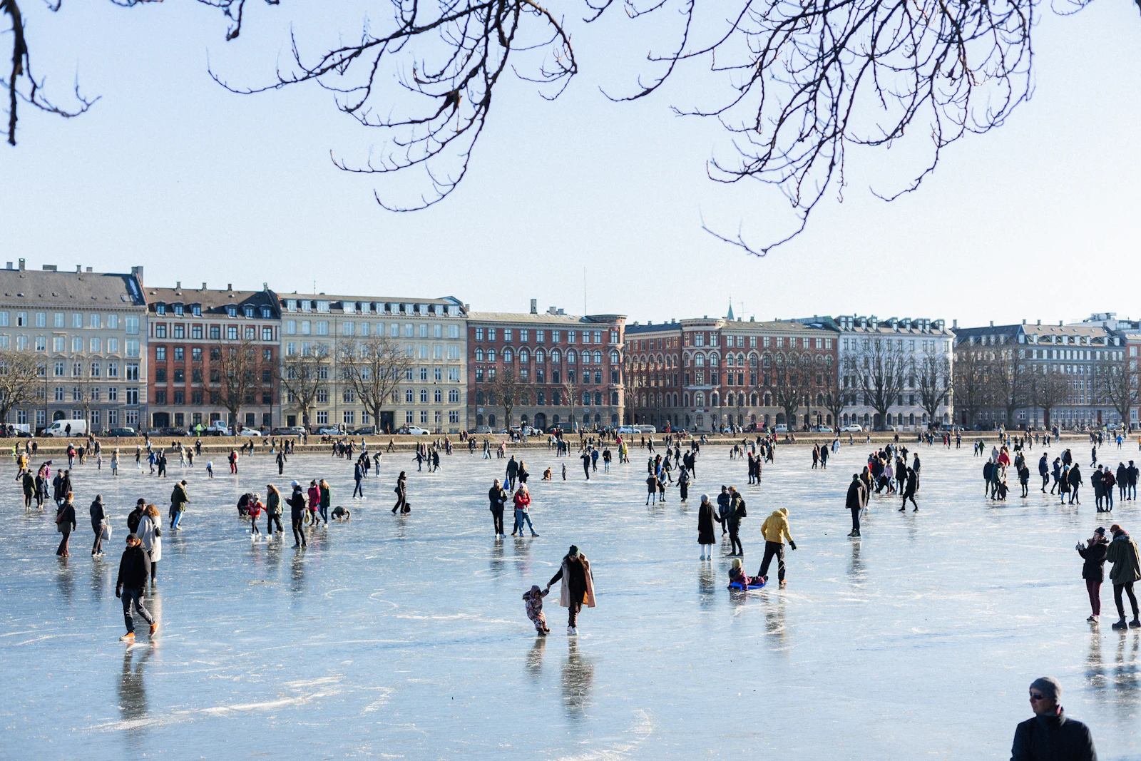 People skating on an outdoor ice rink