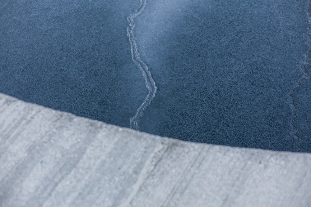 blue textile on brown wooden table