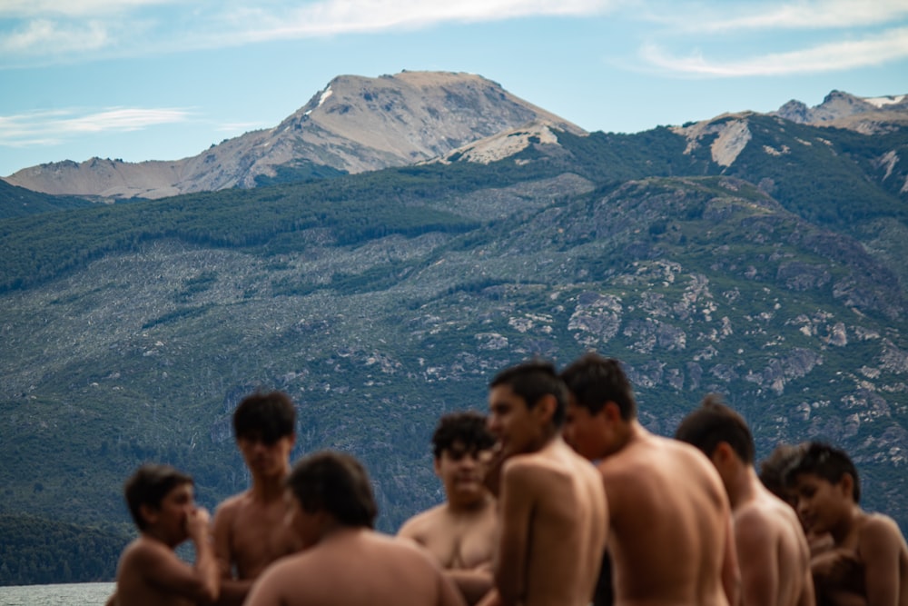 people standing on top of mountain during daytime