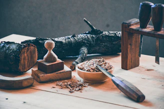 brown wooden bird house on brown wooden chopping board