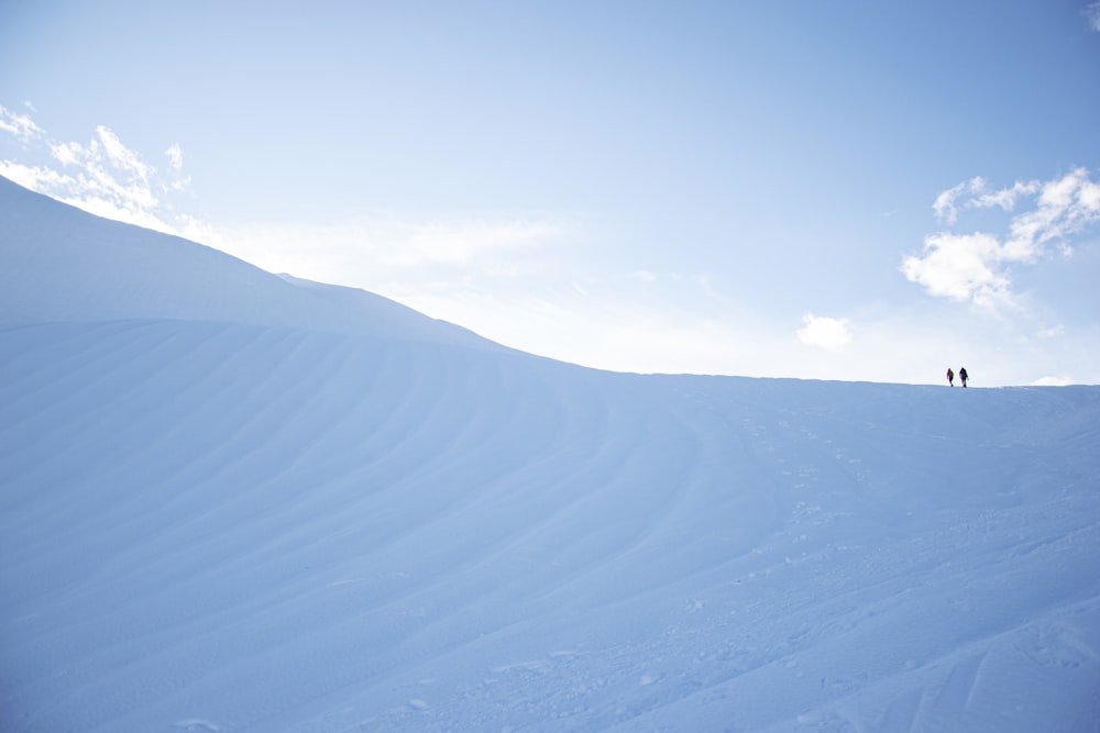 white sand under blue sky during daytime