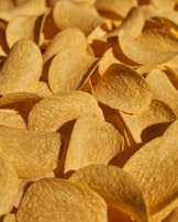 A close-up of crispy chips highlighting their texture and flavor.