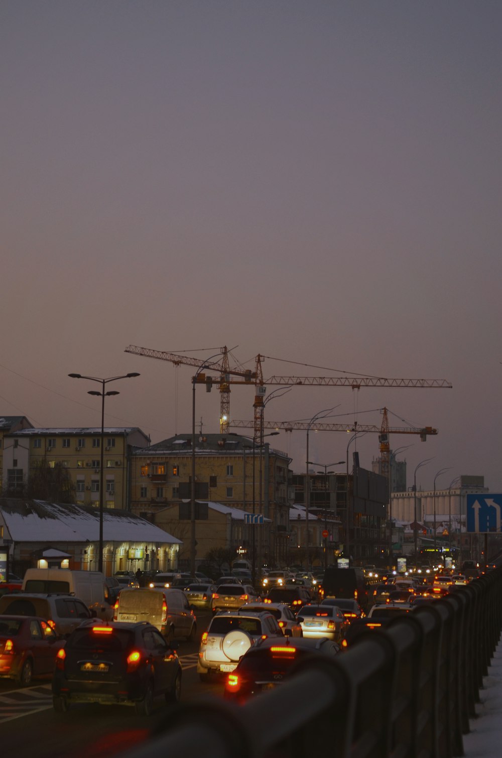 a city street filled with lots of traffic