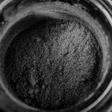 Close-up of finely ground calcium carbonate powder ready for packaging.