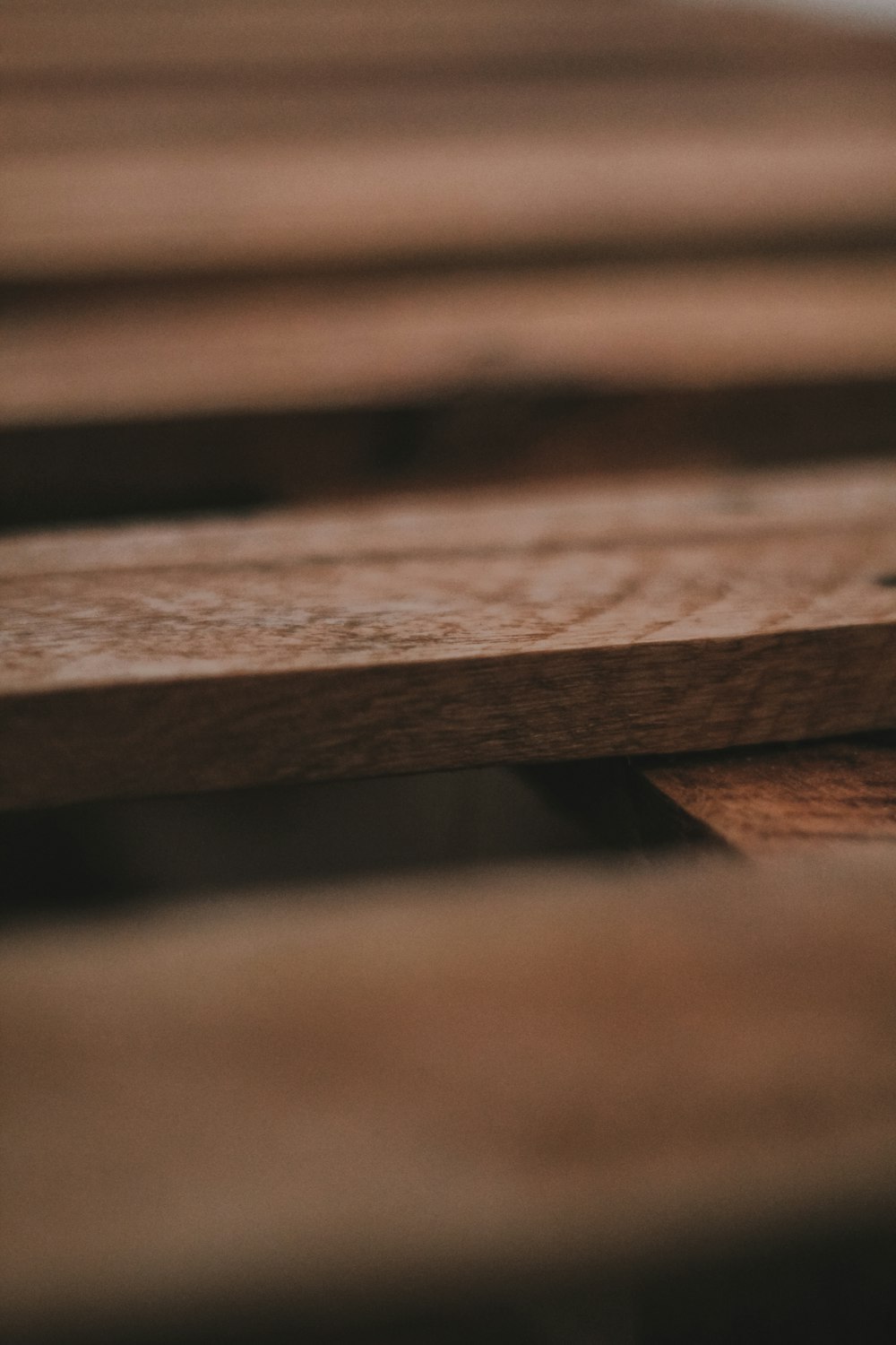 brown wooden plank in close up photography