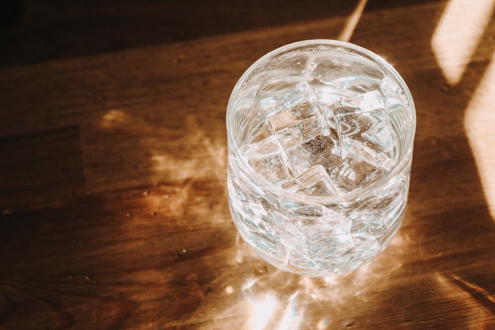 clear cut glass bowl on brown wooden table