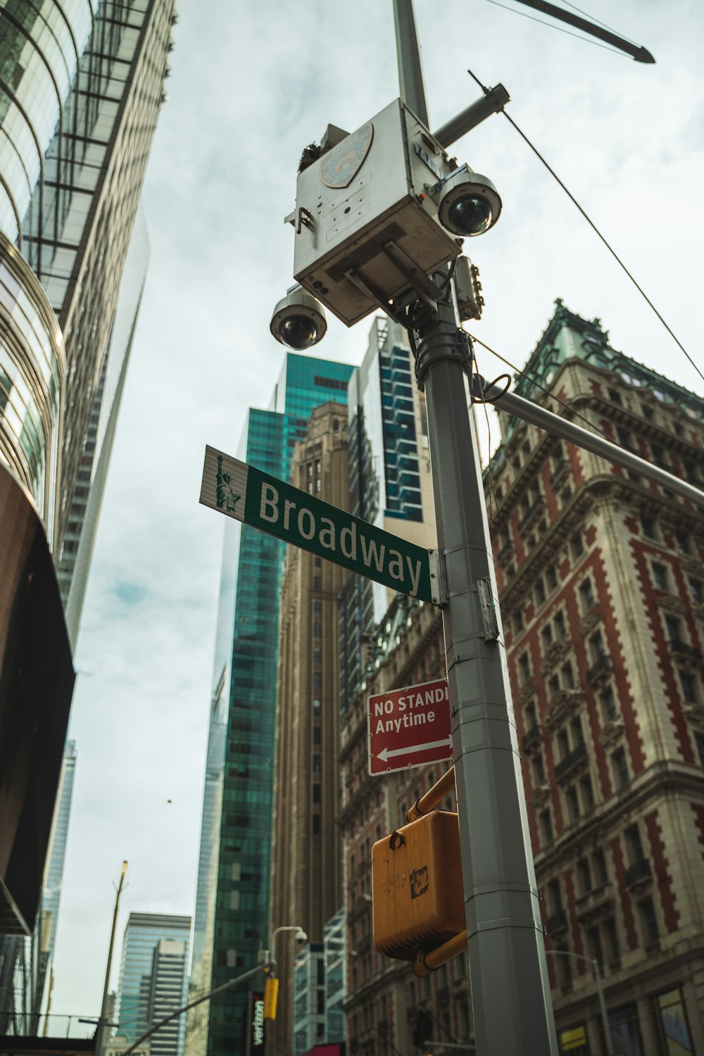 white and blue street sign