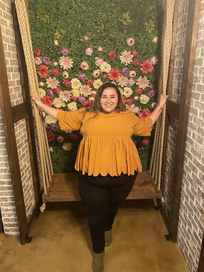 A sturdy swing station set up against a building under construction, showcasing its robust design.