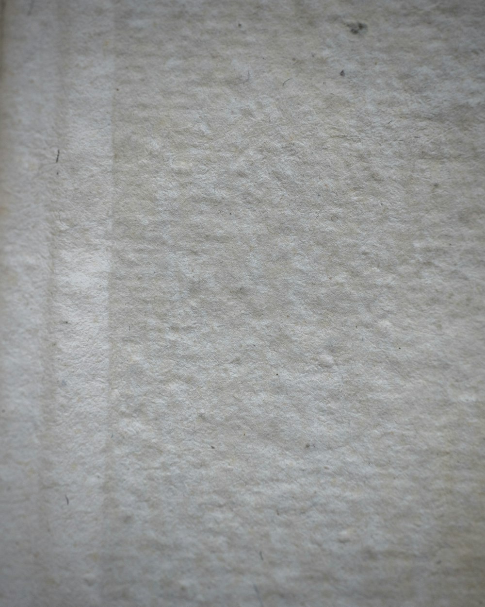 white textile on brown wooden table