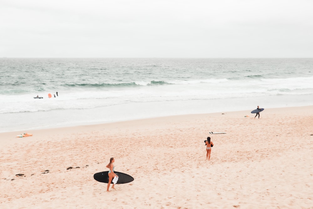 people on beach during daytime