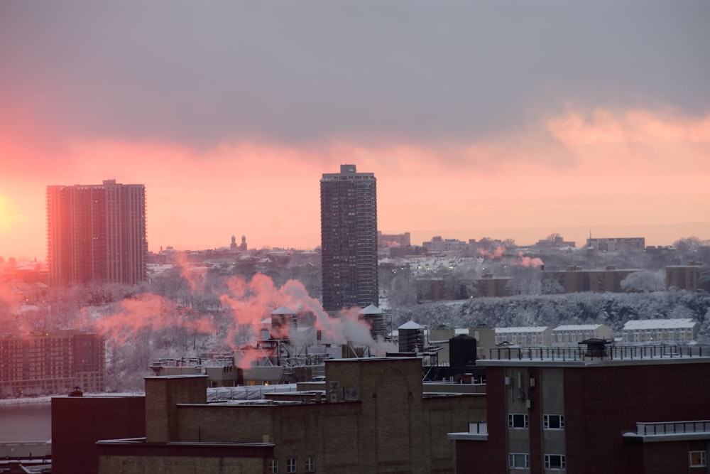 city skyline under orange sky