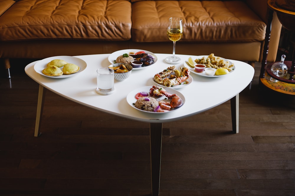 white ceramic plate on white wooden table