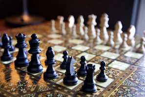 black chess piece on chess board