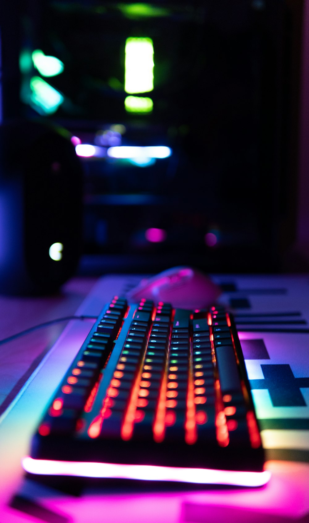 black computer keyboard on brown wooden table