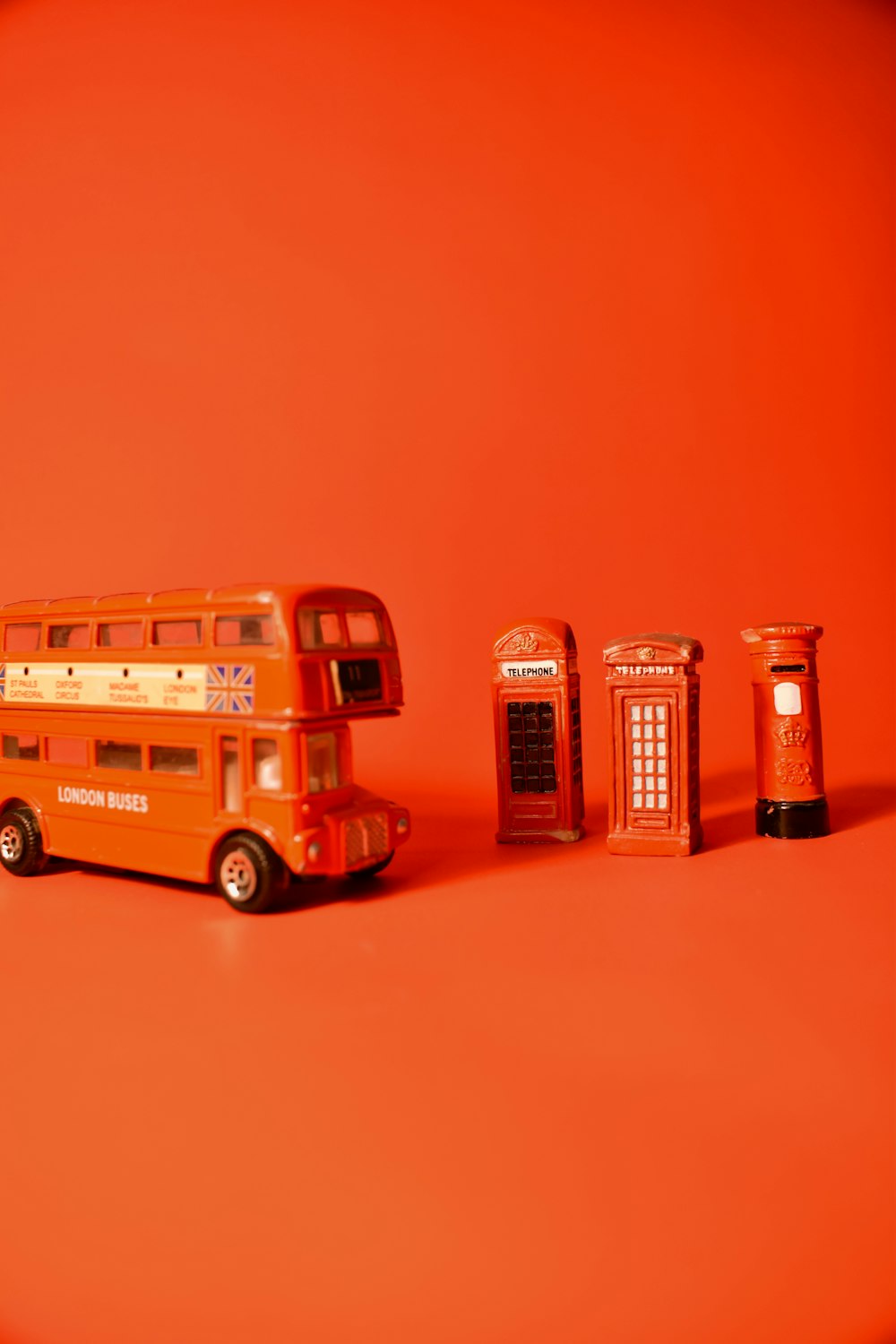 red and white bus scale model