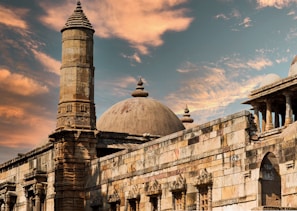 white concrete building under blue sky during daytime