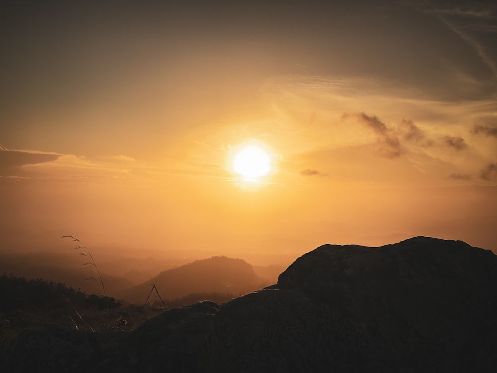 silhouette of mountains during sunset