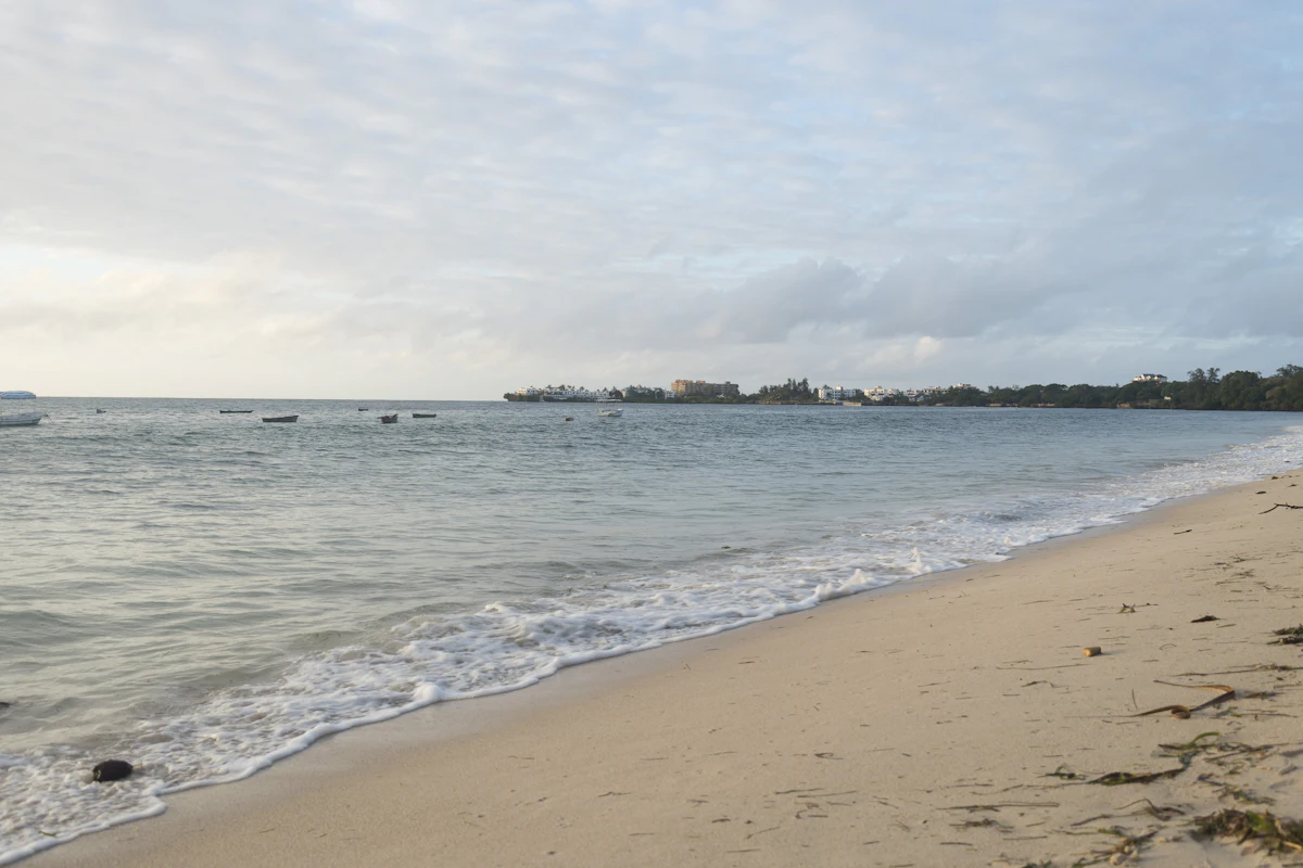 Dhow on a turquoise beach near Mombasa, Kenya