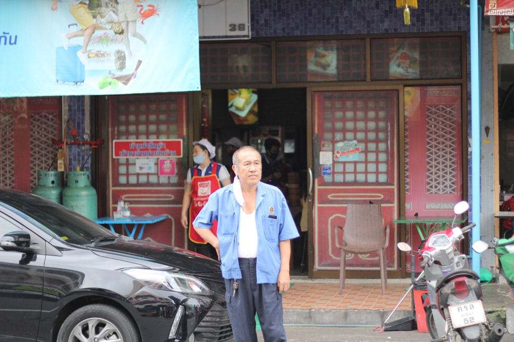 a man is standing in front of a restaurant