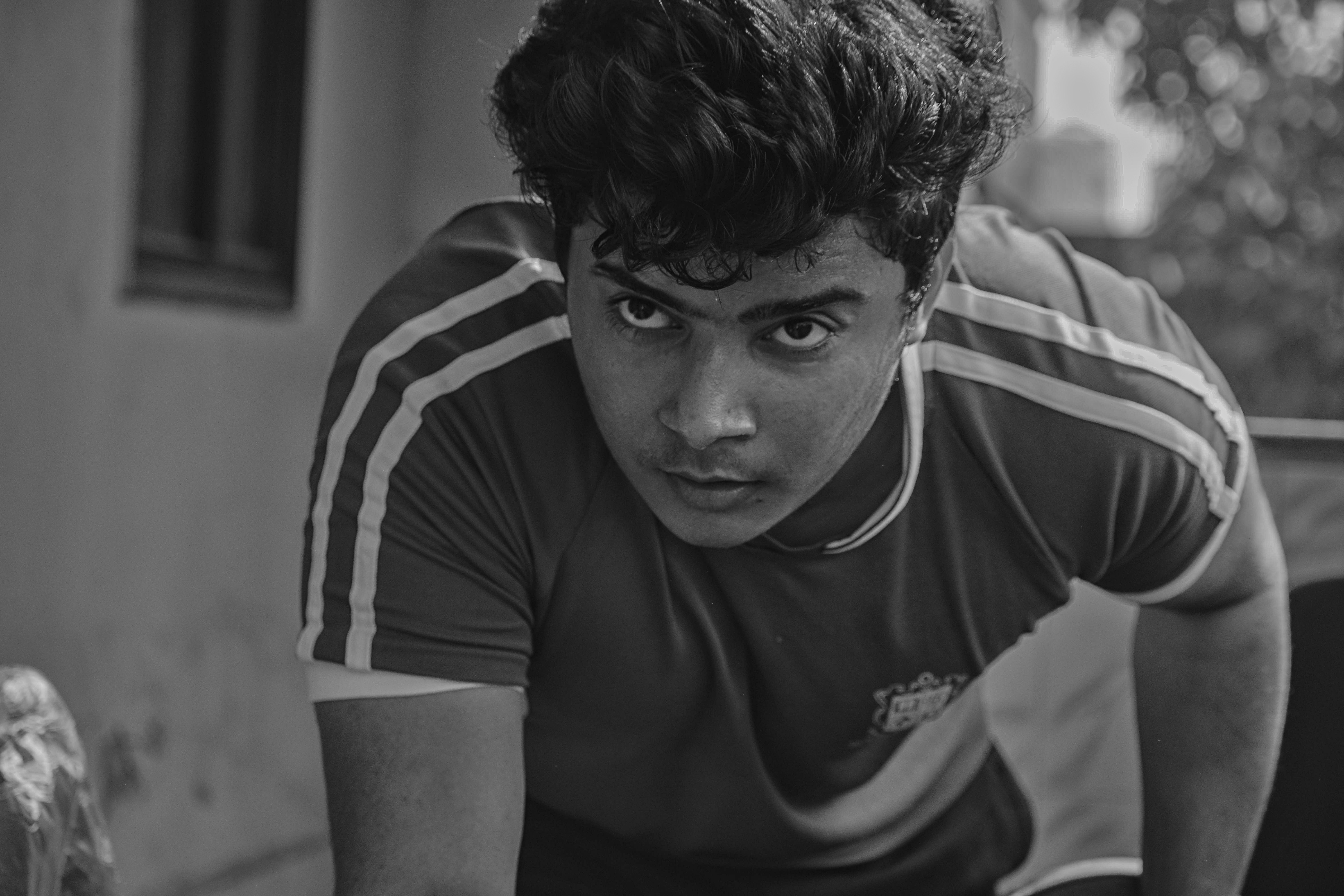 man in black and white crew neck t-shirt, 