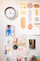 black round analog wall clock
