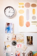 black round analog wall clock
