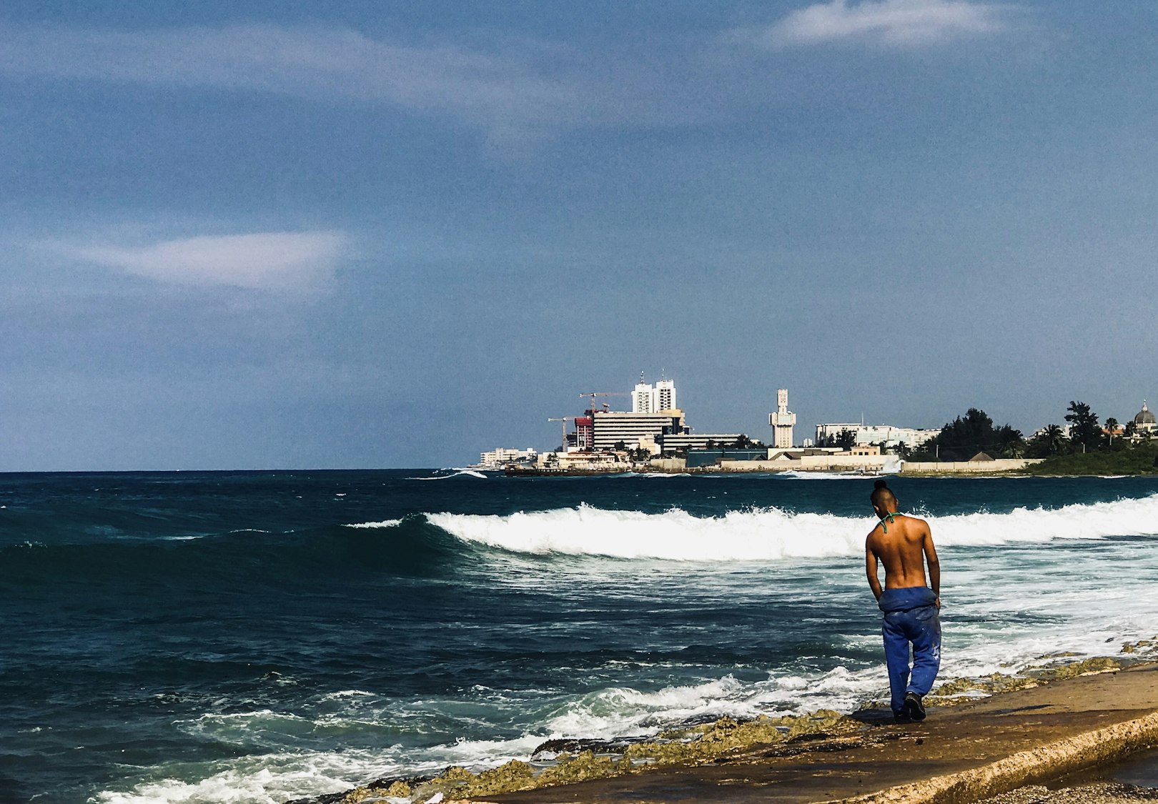 A man on a beach in Cuba (Ricardo IV Tamayo via Unsplash)
