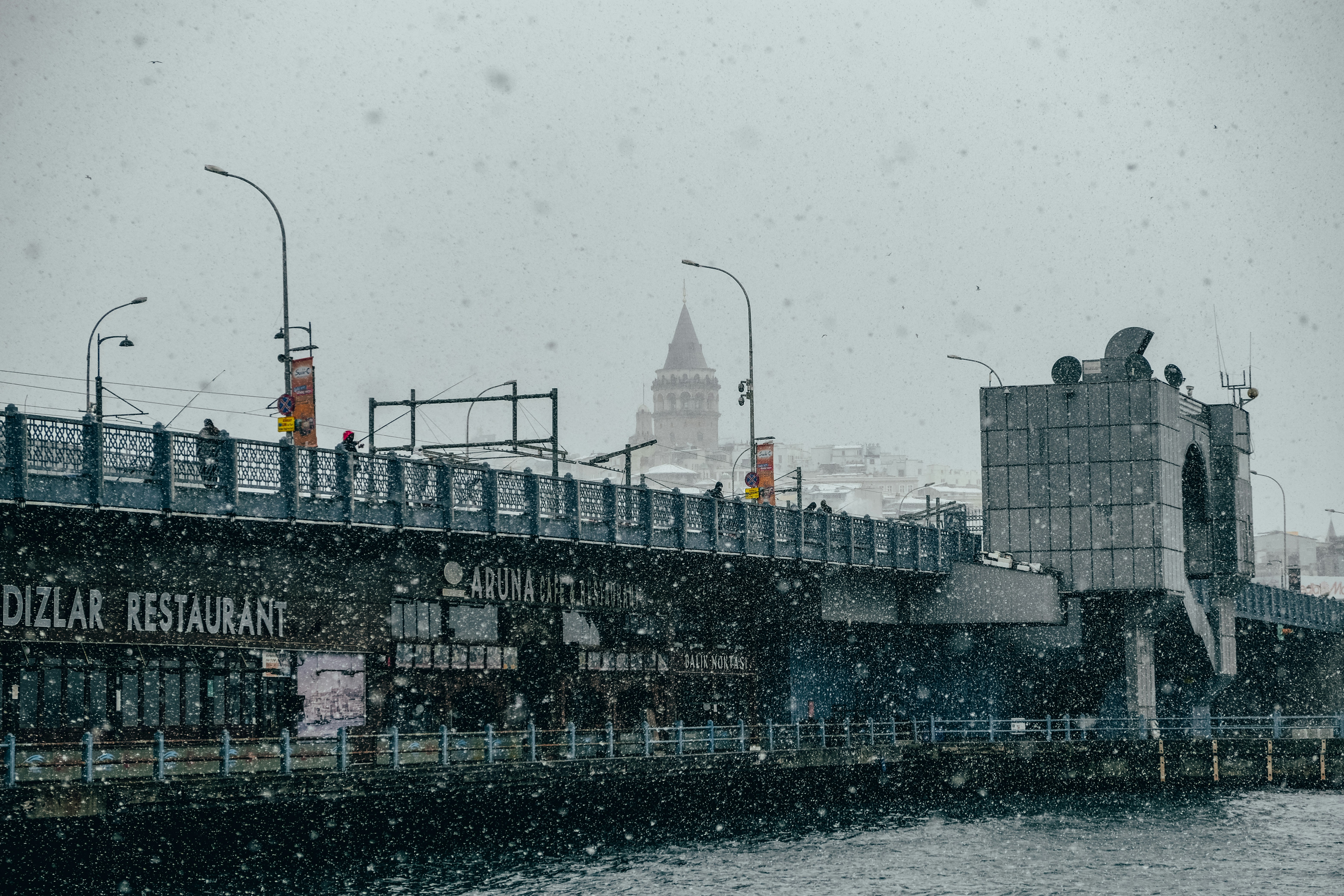 black and white ship on sea during daytime