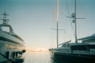 white boat on body of water during daytime