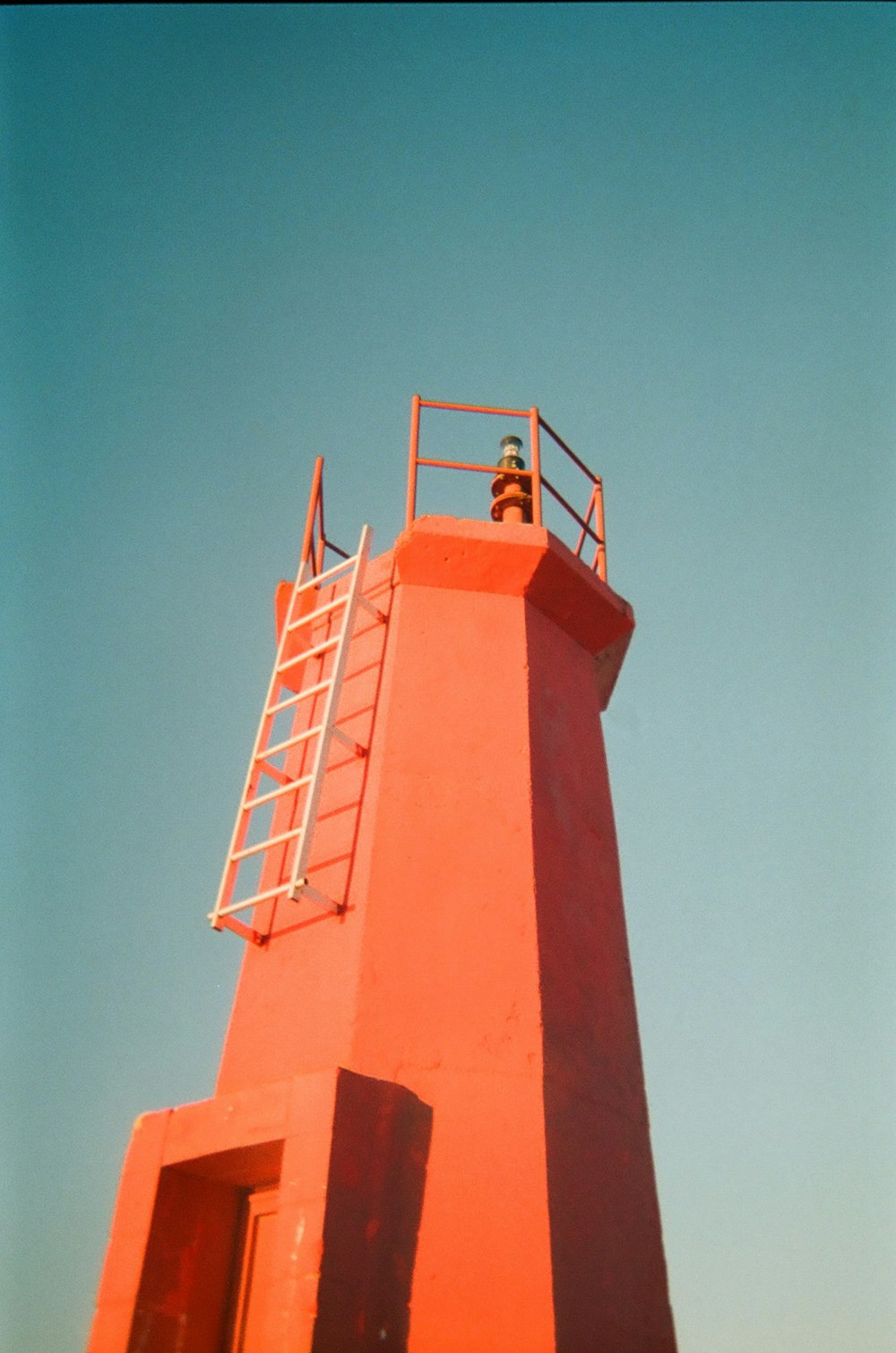 orange and white concrete tower