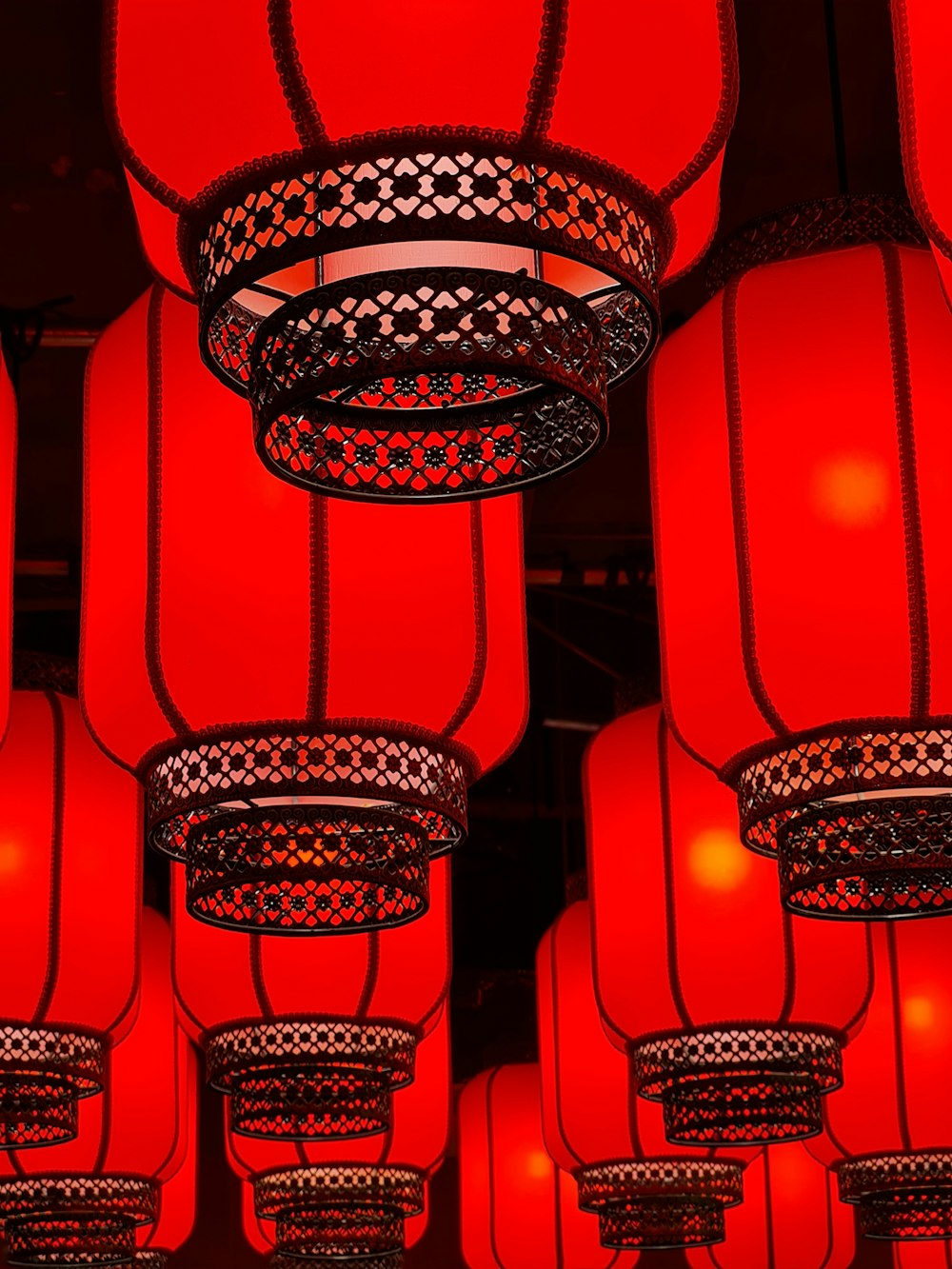 red pendant lamps turned on during nighttime