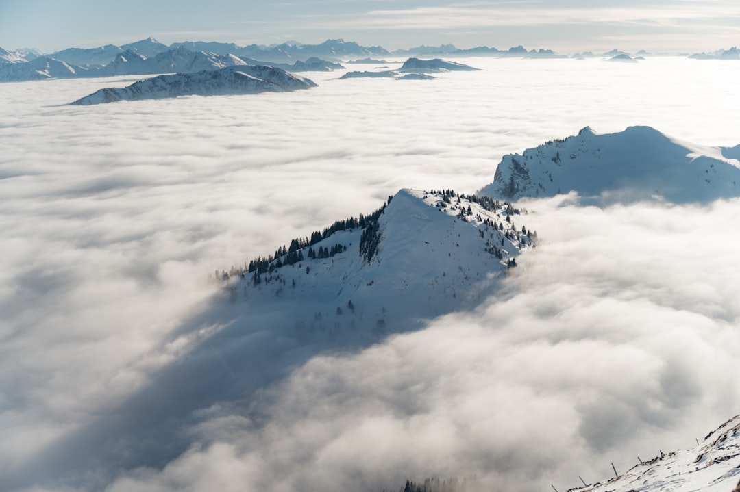 snow covered mountain during daytime