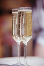clear wine glass with brown liquid