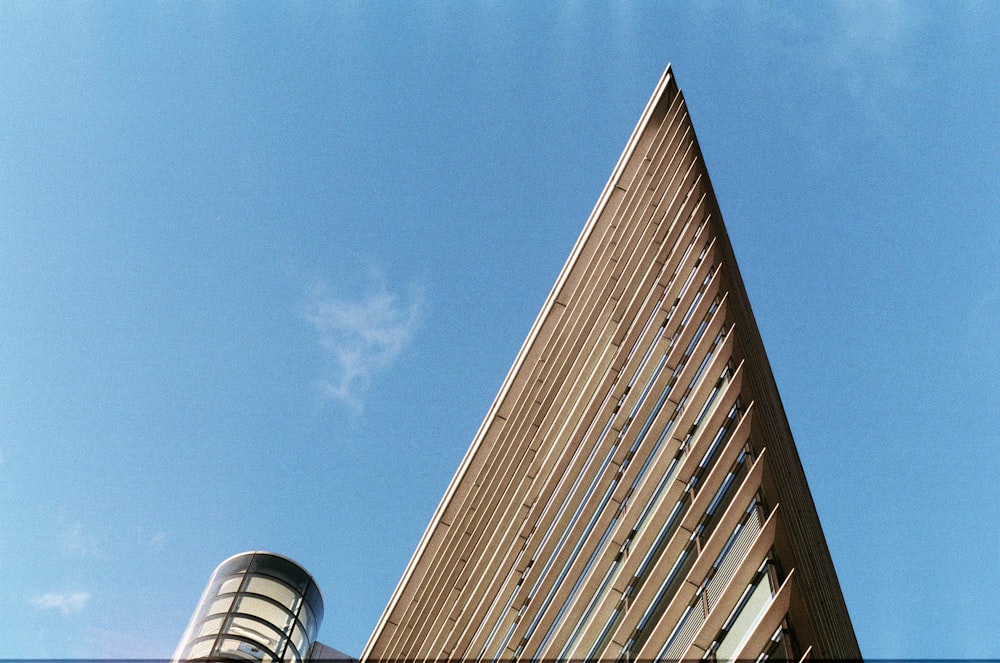 brown concrete building under blue sky during daytime