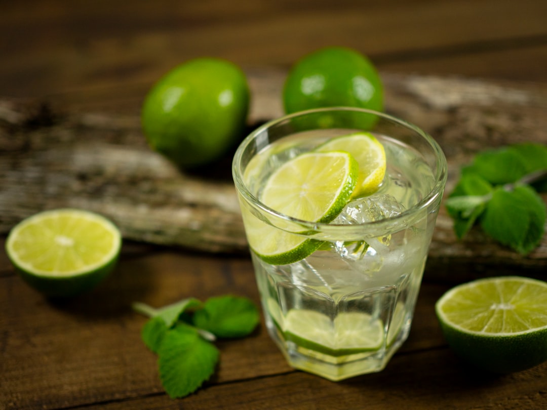 clear drinking glass with green lemon